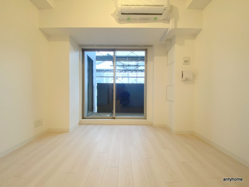 ワールドアイ大阪城EASTアドバンス 仲介手数料無料の居間・リビング