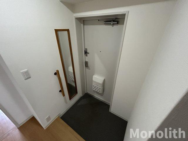 和泉市鶴山台３丁目の賃貸マンションの玄関