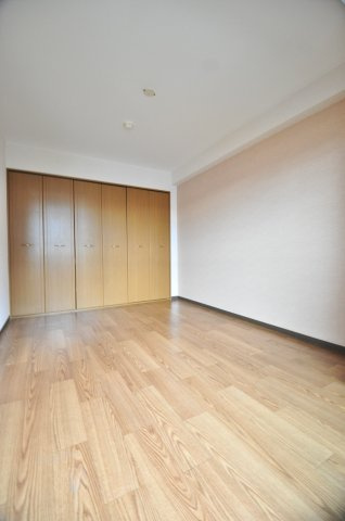 大阪市城東区新喜多東２丁目の賃貸マンションの寝室