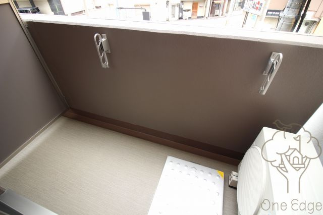 Comenze梅田のバルコニー