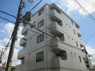 【外観】 | ベルメゾン上新庄 | 建物の個性を主張するシックな外観です