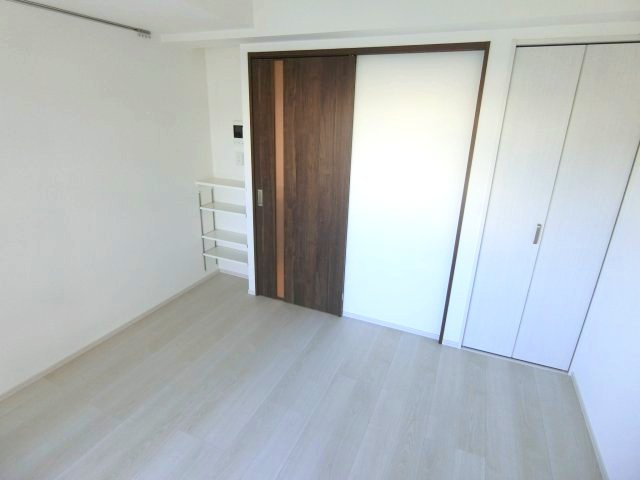 グランリーヴェル新川崎ベリーの寝室