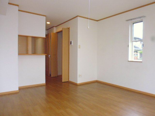 倉敷市福田町古新田のアパートの居間・リビング|洋室