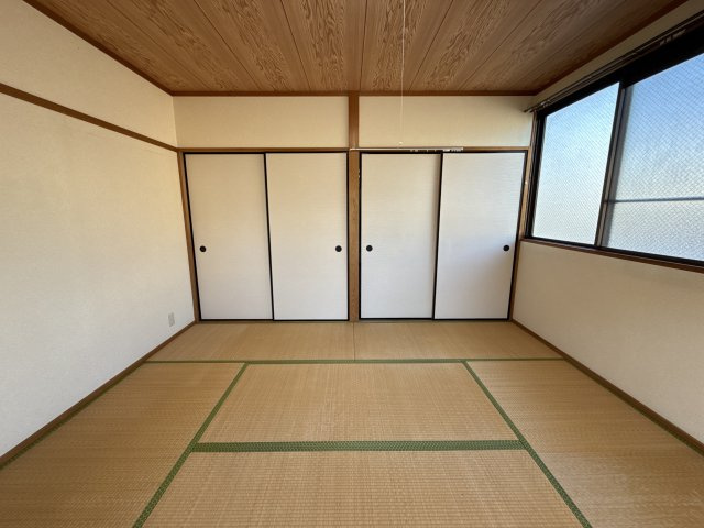 コーポ益三の寝室