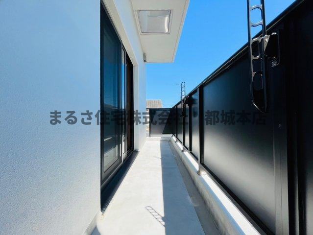 都城市吉尾町の賃貸マンションのバルコニー