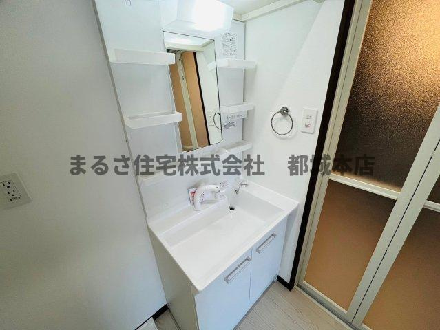 都城市吉尾町の賃貸マンションの洗面所