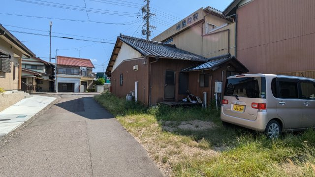 土地　明生町2丁目の前面道路含む現地写真