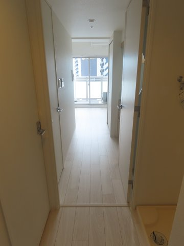大阪市淀川区十三本町２丁目の賃貸マンションの玄関