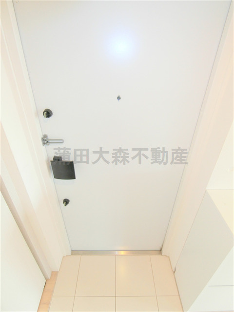 ディアマンテ糀谷の玄関