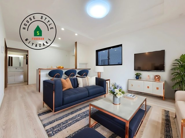 第3清武町今泉モデル（3号棟）の居間・リビング|キッチンからリビングをしっかり確認できます。家族の笑顔があふれる空間になりそうですね。※家具はCGを合成したものです。