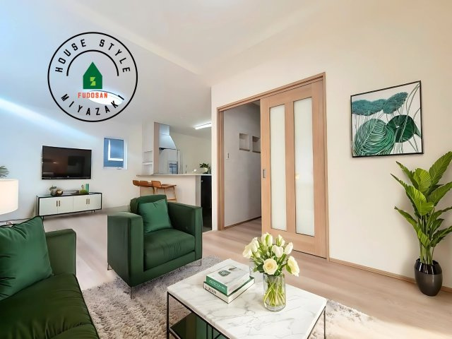 第3清武町今泉モデル（1号棟）の居間・リビング|キッチンからリビングをしっかり確認できます。家族の笑顔があふれる空間になりそうですね。※家具はCGを合成したものです。