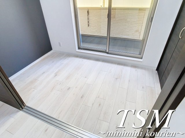 ジーメゾン寝屋川秦町アリビオの洋室