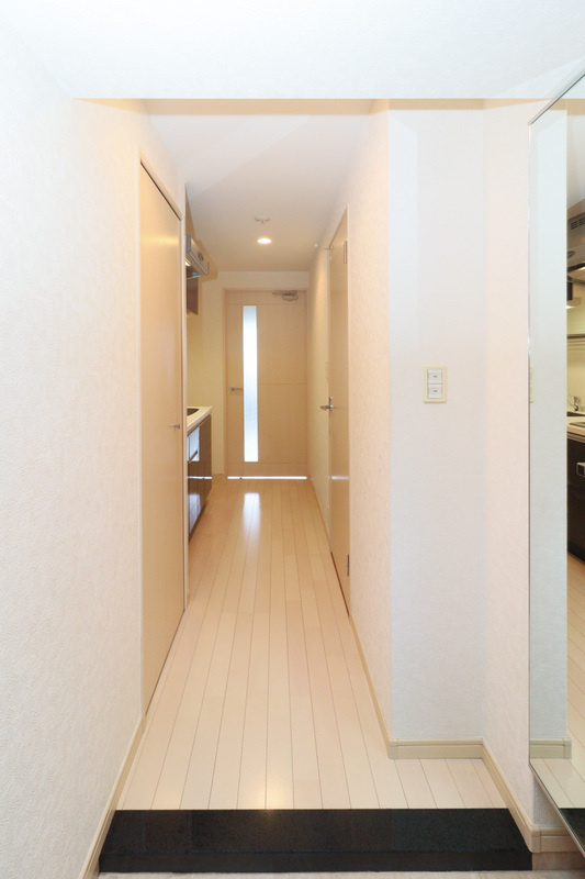 福岡市博多区千代１丁目の賃貸マンションの玄関