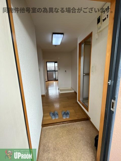 メゾン庄名の玄関