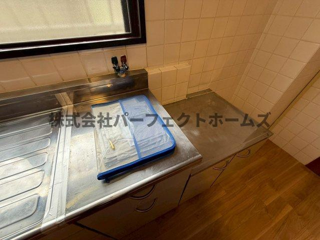 富田マンションのキッチン|コンパクトなキッチンで掃除もラクラク