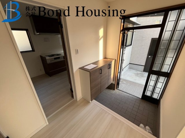 「倉庫つき」「屋根付きガレージ」大久保町八木 築23年の玄関