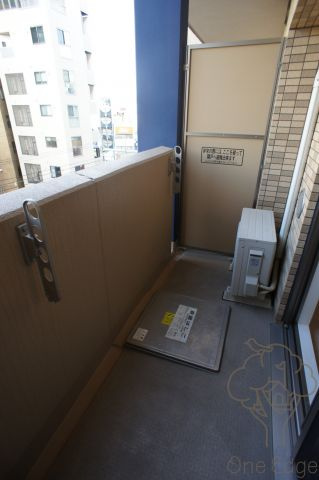プレサンス天満ステーションフロントのバルコニー