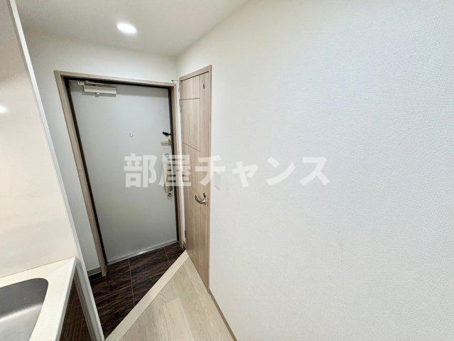 メイプルコート泉の玄関