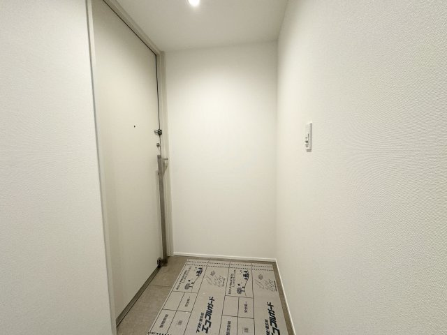 グラン・ブルー高輪アドニスA棟の玄関