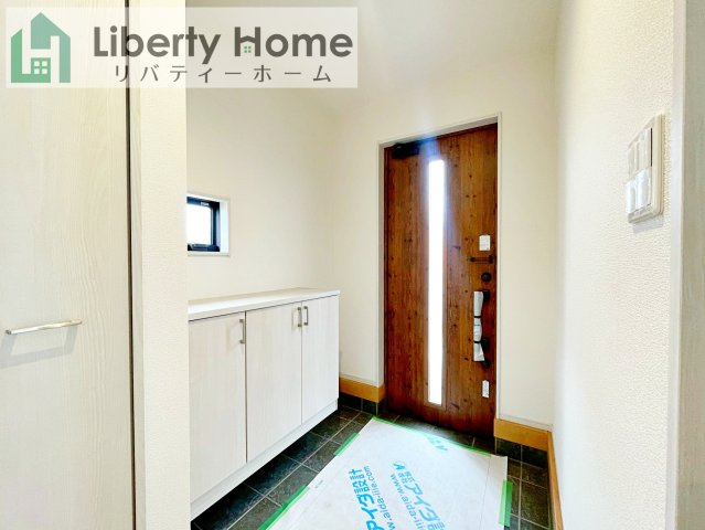坂東市沓掛23-P1　新築戸建　15号棟　の玄関