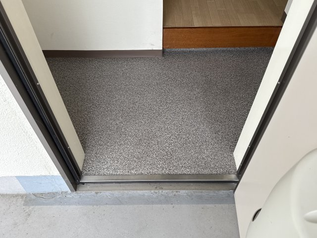 たくみマンションの玄関