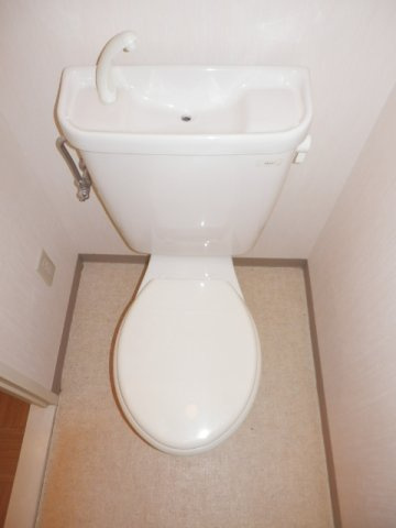 大阪市城東区成育２丁目の賃貸マンションのトイレ