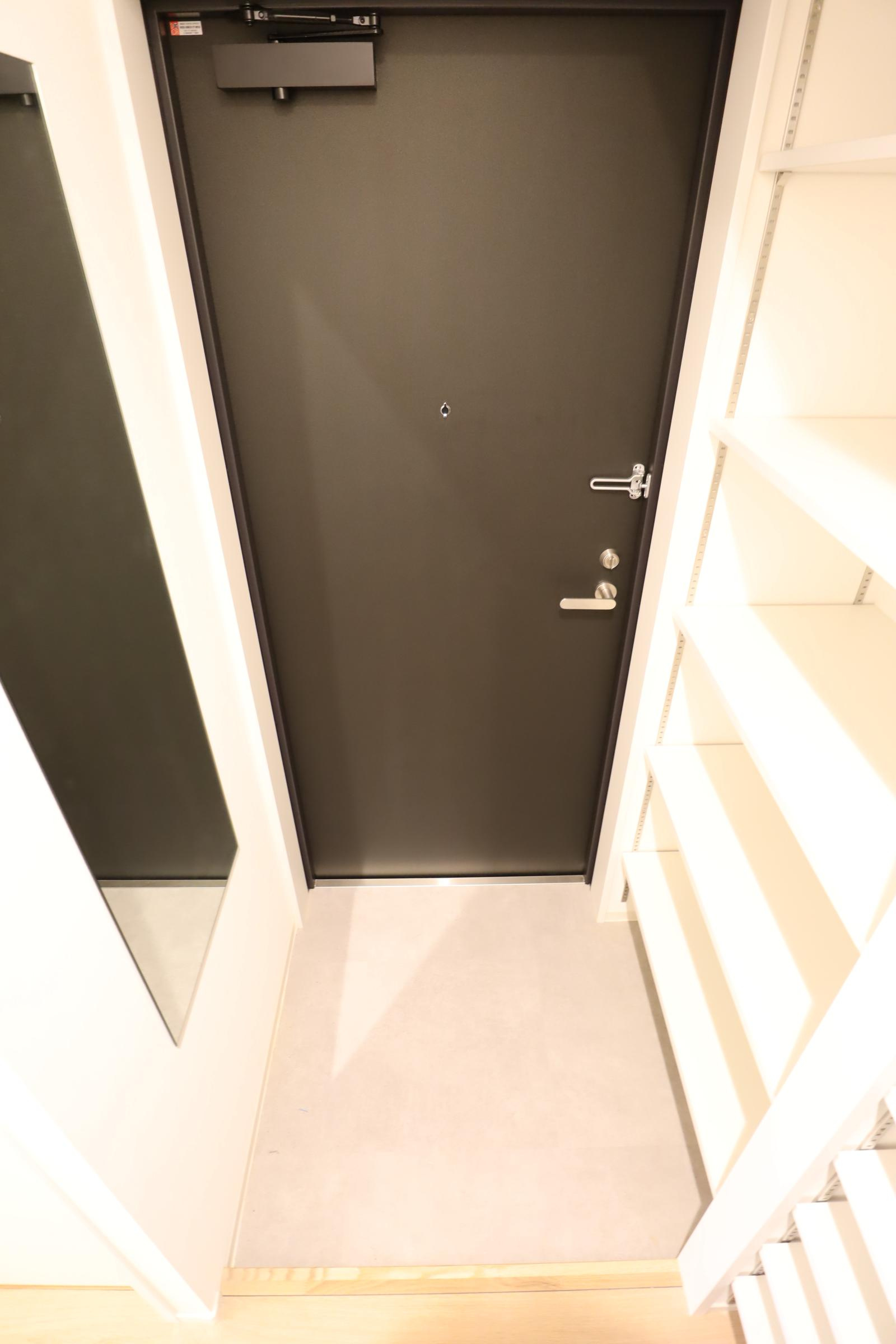 大阪市都島区片町１丁目の賃貸マンションの玄関