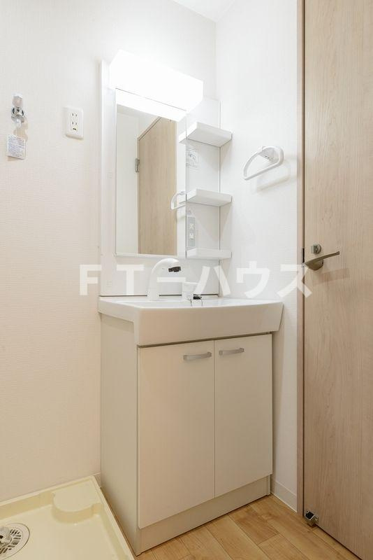 メゾンドアルクの洗面所