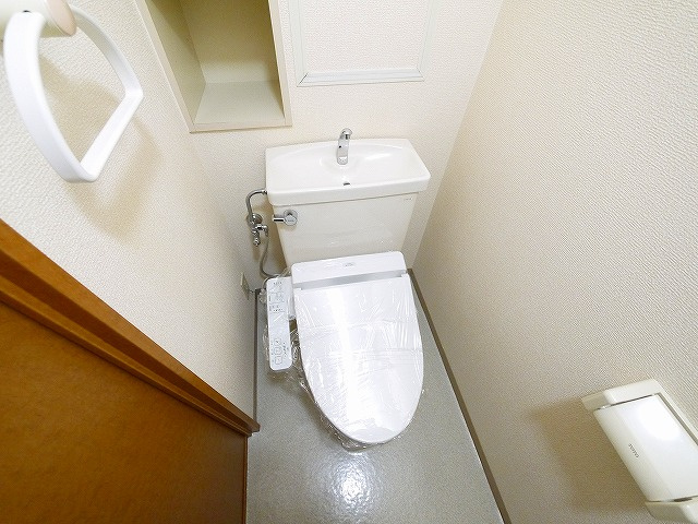 ローレルスクエア登美ヶ丘第1期1番館のトイレ|落ち着いた色調のトイレです