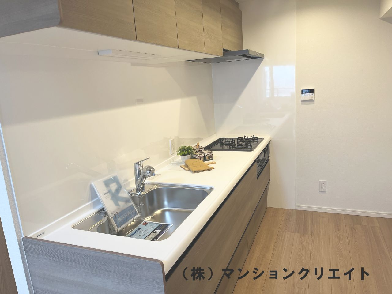 シンフォニアガーデン福井のキッチン|吊戸棚や引き出し式収納でたくさん収納出来ます。