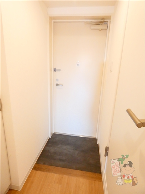 グランヒルズ西古松の玄関