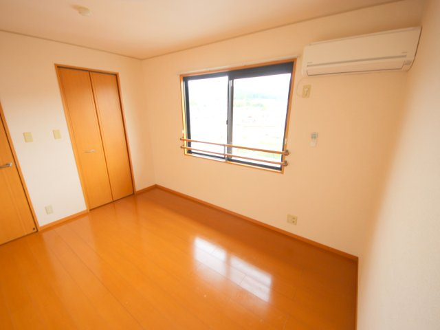 リビングタウン南生駒Bの居間・リビング