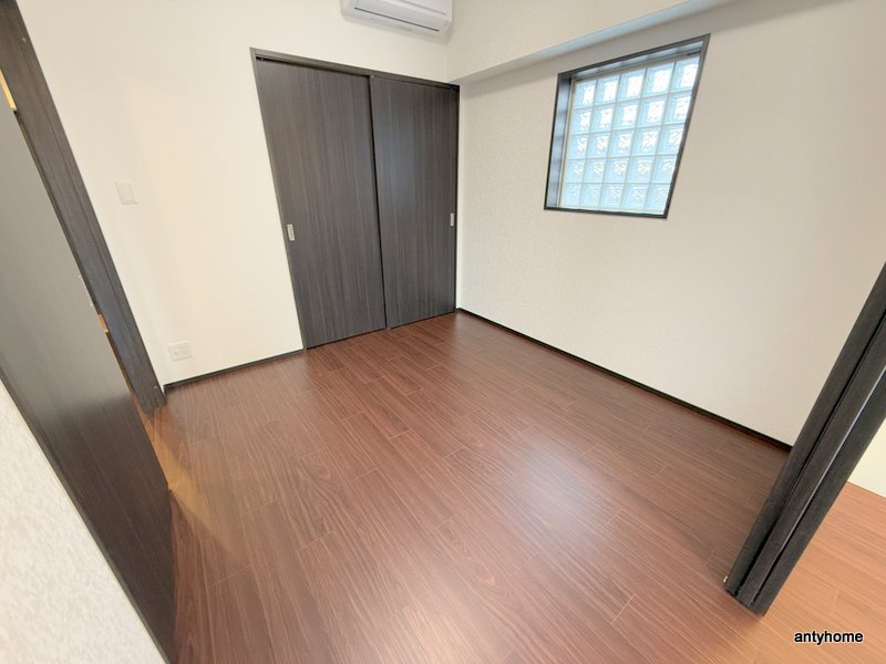 プレジオ三国ASIAN　仲介手数料無料の寝室