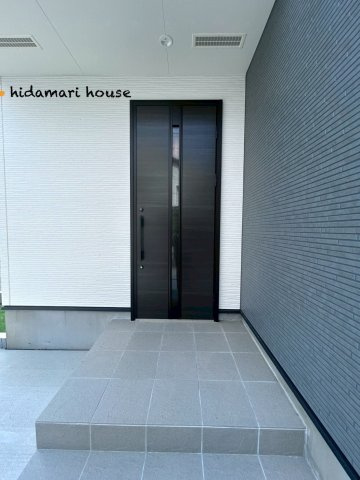 西区内野本郷　新築戸建01の玄関