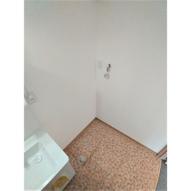 栄寿荘の設備|洗濯機置き場