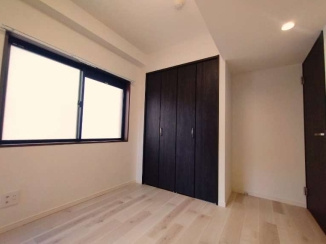 ワイズユウラク西所沢の洋室