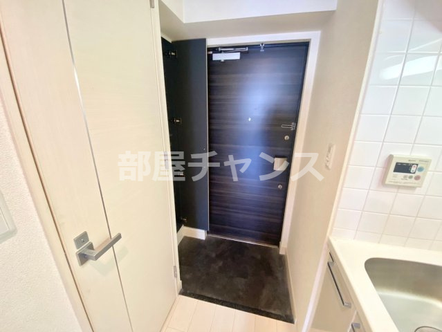 プレサンス栄モードの玄関