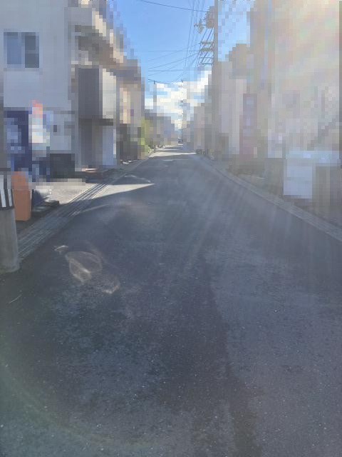 高知市弥生町　売土地の前面道路含む現地写真
