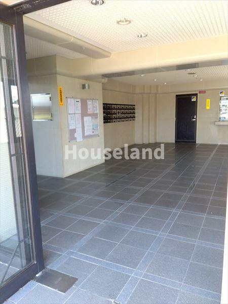 サンライズマンション岩出Ⅴ壱番館　４０３号のエントランス