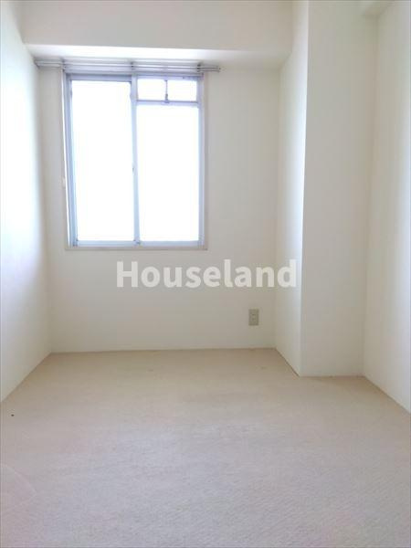 サンライズマンション岩出Ⅴ壱番館　４０３号の洋室