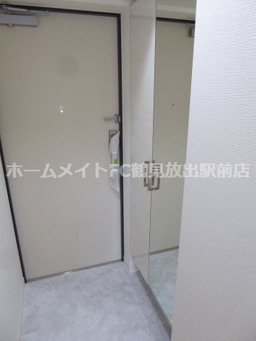 大阪市東成区深江北２丁目の賃貸マンションの玄関