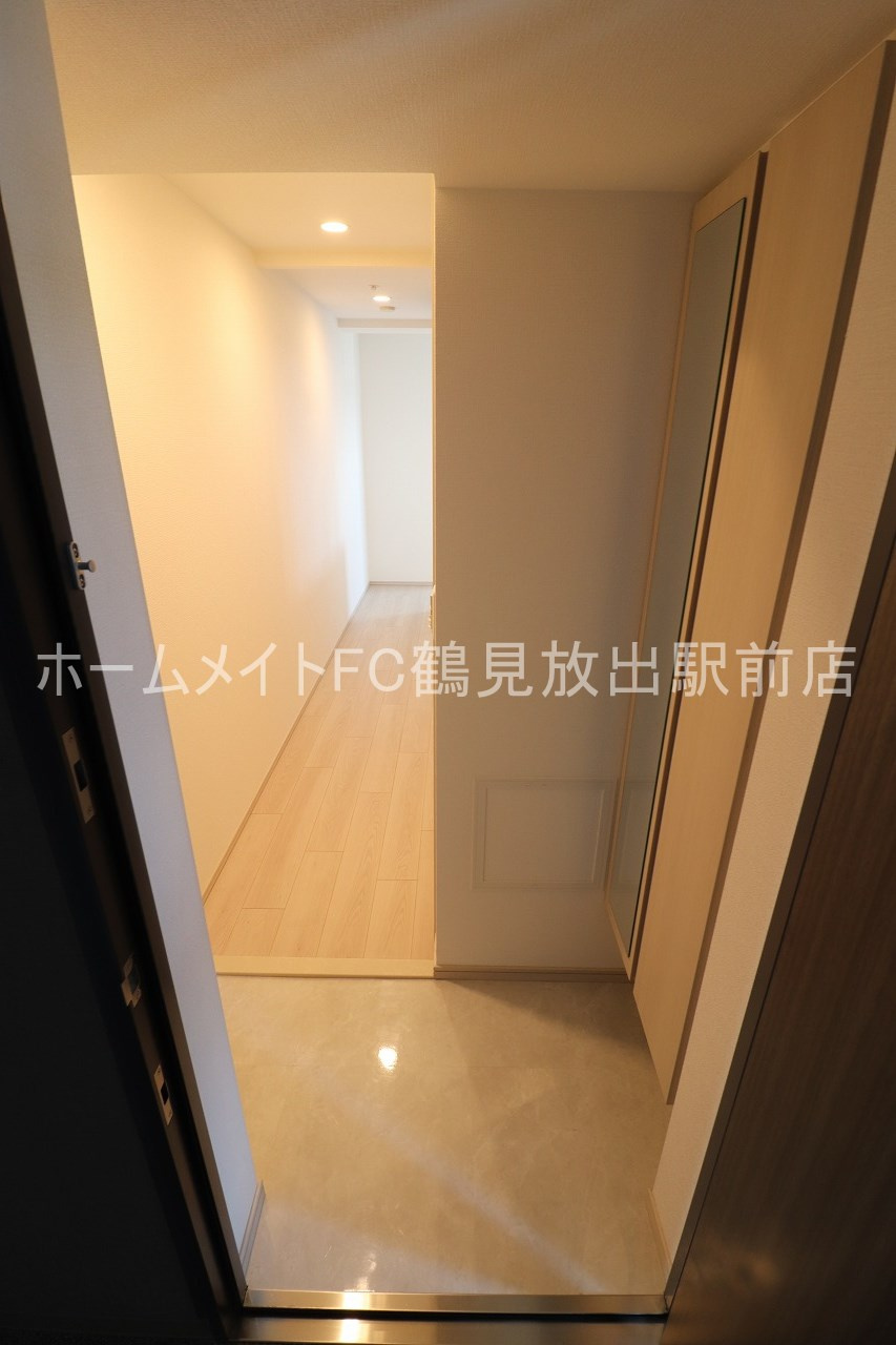 大阪市鶴見区茨田大宮４丁目の賃貸マンションの玄関