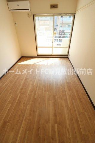 大阪市鶴見区放出東３丁目の賃貸マンションの洋室