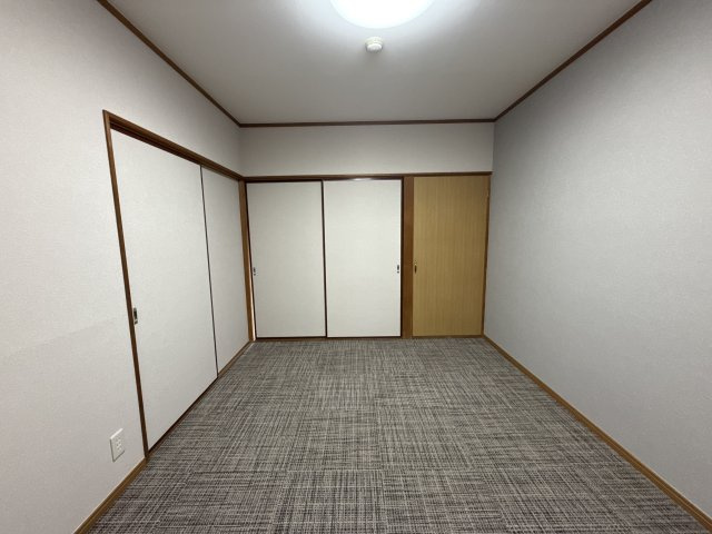 マイアール新町の寝室