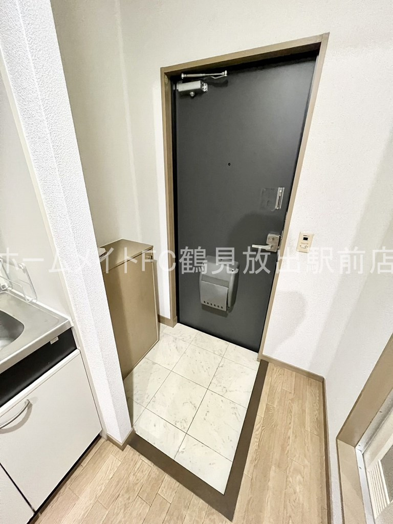大阪市鶴見区今津北５丁目の賃貸マンションの玄関