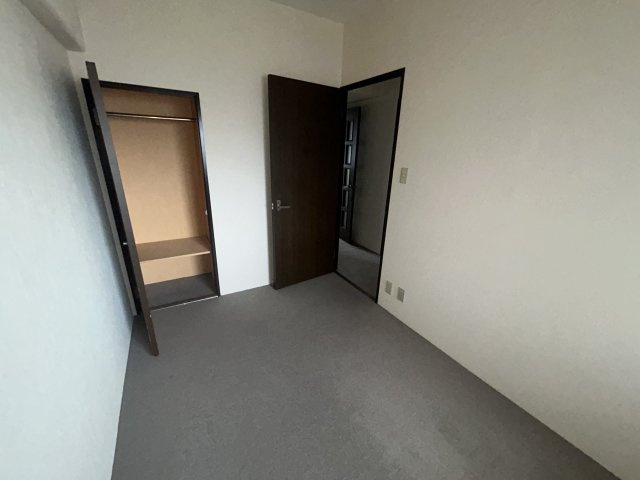 シャルマンフジ岩出参番館の洋室