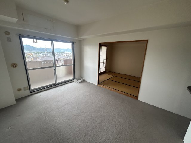 シャルマンフジ岩出参番館の居間・リビング