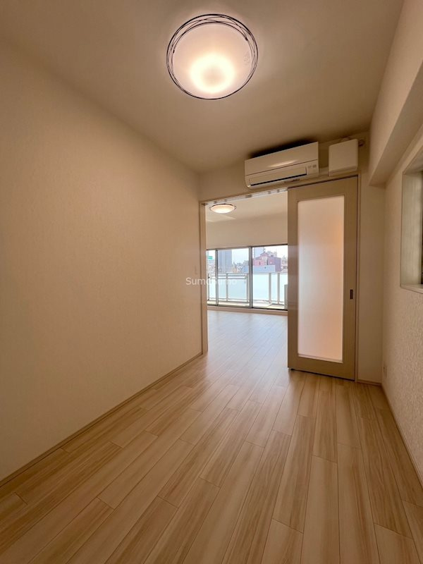 大阪市西区本田２丁目の賃貸マンションの寝室