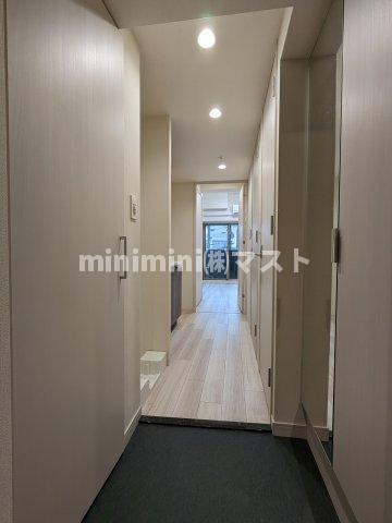 プレサンス福島吉野ミナージの玄関