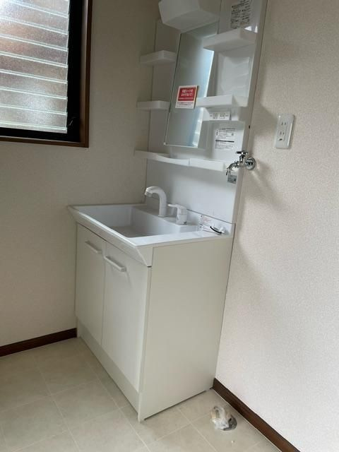 ハッピーハウスの洗面所|ゆったりとスペースのある洗面所